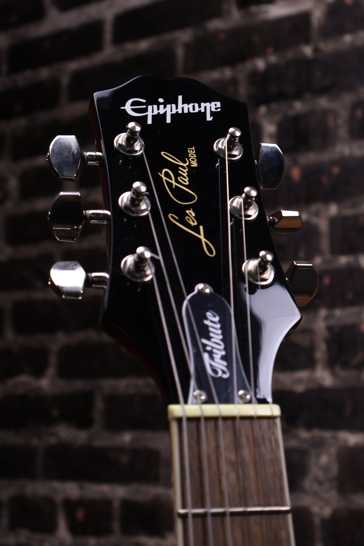 Epiphone Les Paul Tribute Plus Electric Guitar - Transparent Ebony